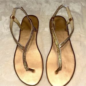 Woman’s sequin gold sandles